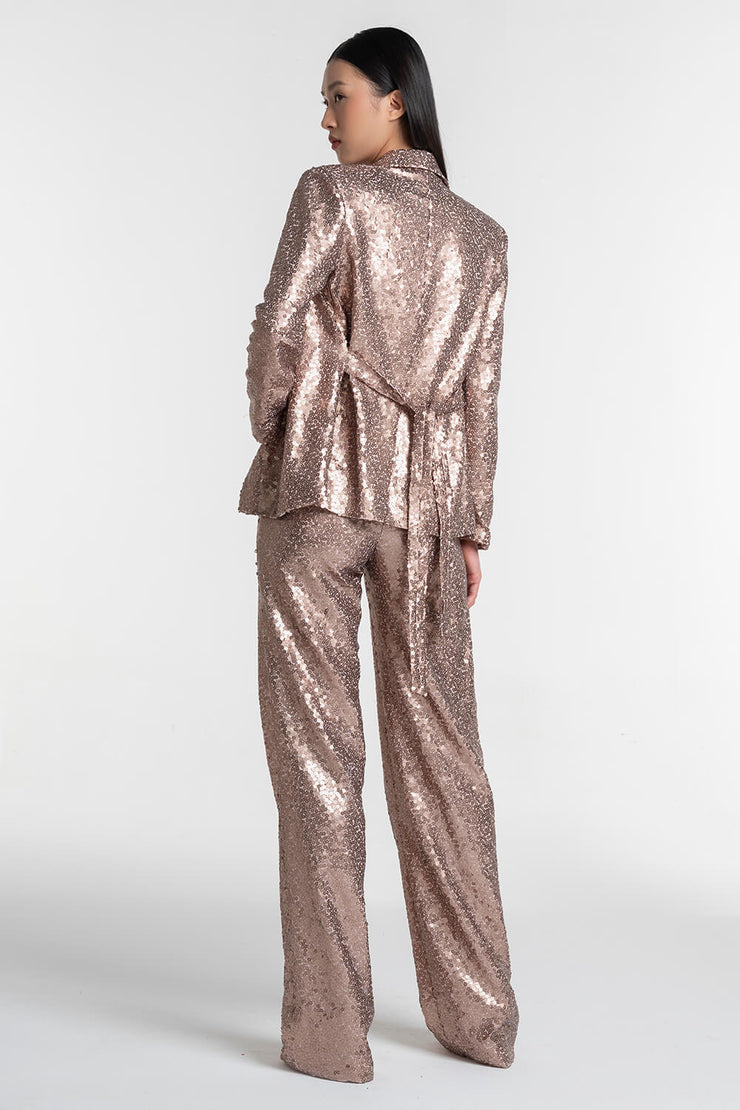 Pantalon à paillettes or rose